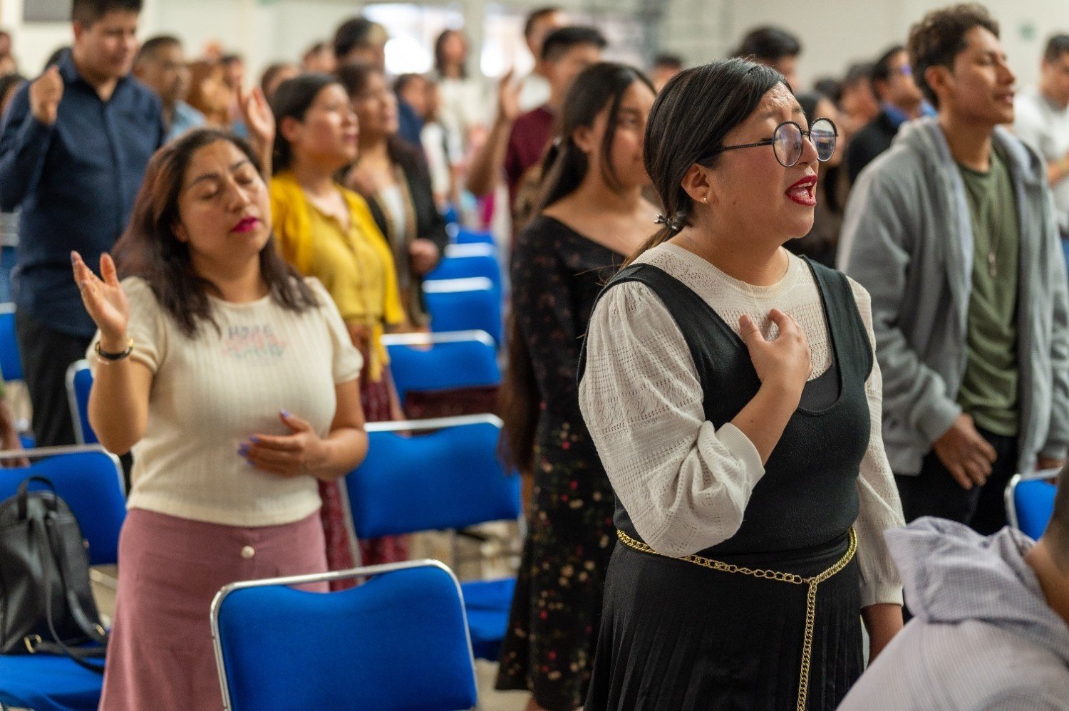 Members singing during praise and worship