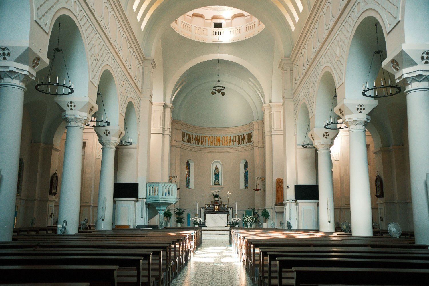 Sunlight filling the church aisle